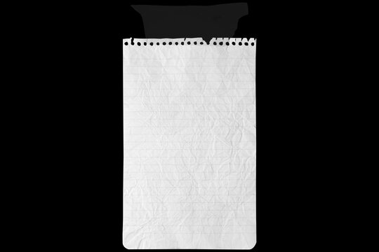 a piece of notebook paper stuck together with a torn piece of tape