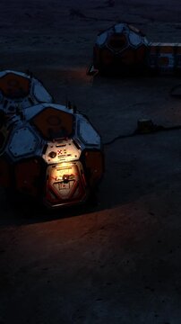 Several structures are placed on a dark surface, showing lights on some of them. These structures seem to be part of a planned settlement or exploration project on another planet.