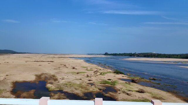 Elevated Passenger POV Crossing Highway Bridge Over Seasonal Riverbed With Extensive Sandbanks South India