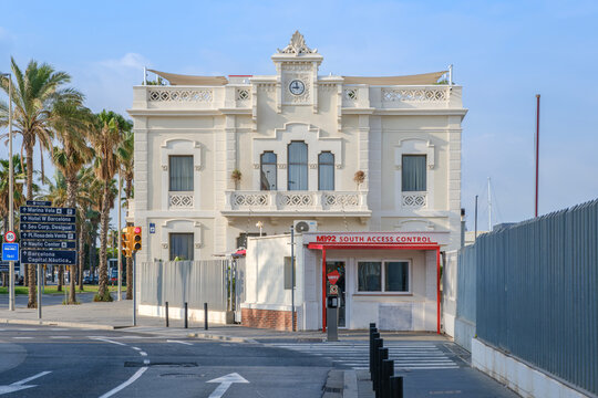 Historic Building at Port Area, Barcelona, Clock Facade, Direction Signs to Marina Vela