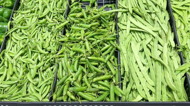 Fresh Green Bean Varieties in Supermarket Produce Section