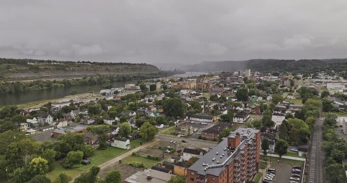 Steubenville Ohio Aerial v1 flyover from Jacksonville across the town center toward the Ohio River, bridges and wooded hillsides - Shot with Mavic 3 Pro Cine - Sept 22nd 2023