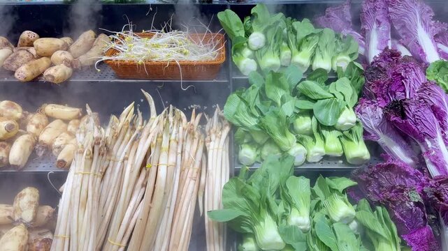 Fresh Leafy Greens and Herbs in Supermarket Produce Section 