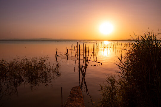 A beautiful sunset over La Albufera Natural Park in Valencia, Spain