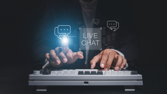 Hands typing on a keyboard with live chat icons and messaging interface. Concept of online communication, customer support, chatbot, instant messaging, and digital service.