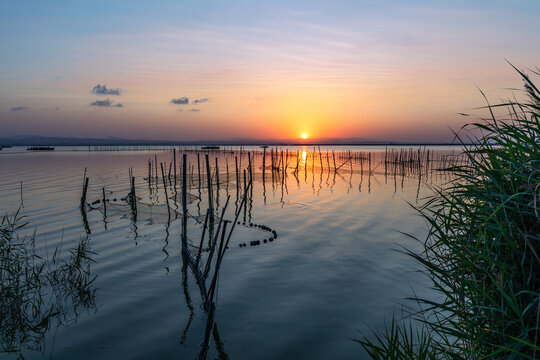 A beautiful sunset over La Albufera Natural Park in Valencia, Spain
