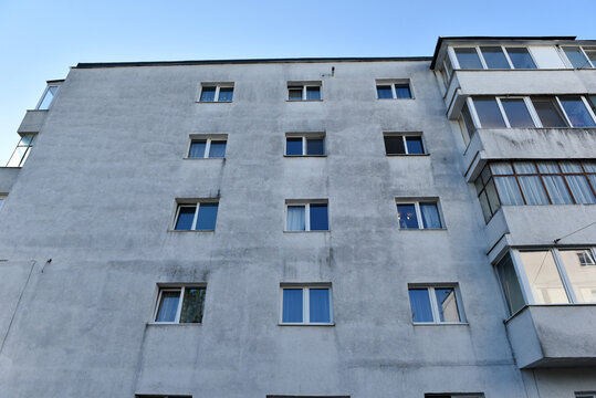 Typical facade of concrete panel building. Post Soviet flat of blocks