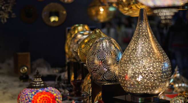 A splendid display of finely perforated oriental handcrafted lamps that create evocative plays of light.