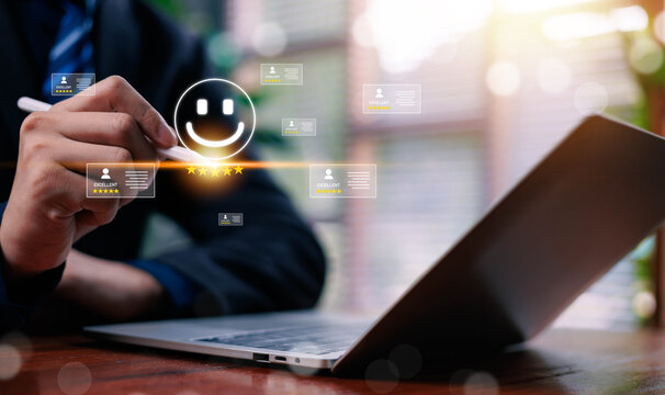 Business professional using a digital interface with a five-star rating and positive reviews, representing customer satisfaction, online reputation, feedback, and service quality.