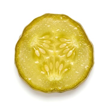 A single slice of a pickled cucumber isolated on white background