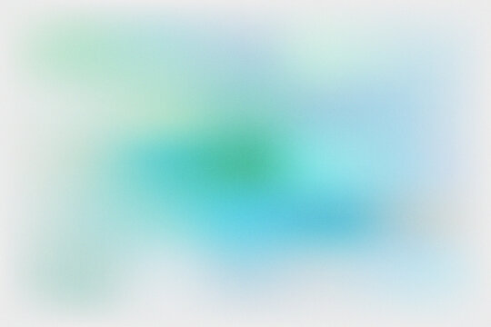 Abstract soft gradient background with grainy texture in blue and green colors