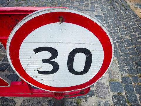 Speed Limit Sign Road Traffic Thirty Warning Metal Weathered Barrier Cobblestone Street Regulation Closeup Urban
