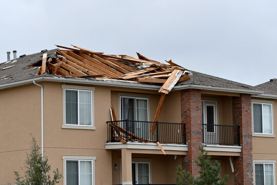 Roof damage on building after storm