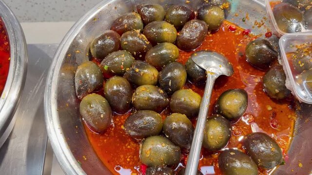 Traditional Chinese Century Eggs in Savory Marinade 