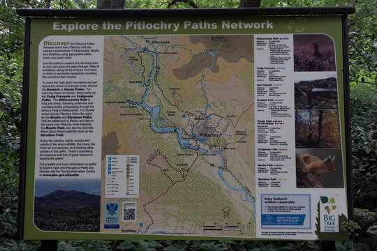 Pitlochry, Scotland - July  22, 2026: Information sign displaying a map of walking routes and details for exploring outdoors