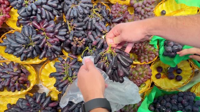 Fresh Grape Varieties in Supermarket Fruit Section &ndash; Green, Red and Black Table Grapes on Display