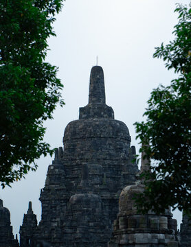 Candi Sewu Main Stupa Framed by Green Trees in Prambanan Temple Complex, Central Java, Indonesia