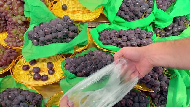 Fresh Grape Varieties in Supermarket Fruit Section &ndash; Green, Red and Black Table Grapes on Display
