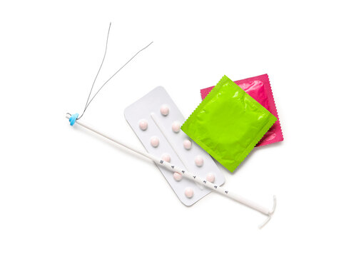 Birth control methods including an IUD, contraceptive pills, and condoms for family planning and sexual health