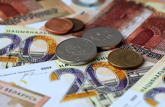 Belarusian ruble money banknotes and coins on table. Belarus cash bills of BYN currency