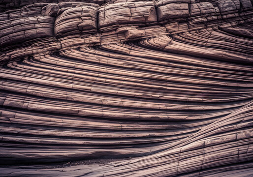 Abstract sandstone rock formation with swirling patterns