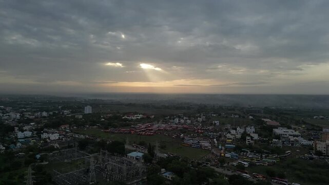 Panoramic Sunrise: An Awakening Landscape Under Cloudy Skies.
