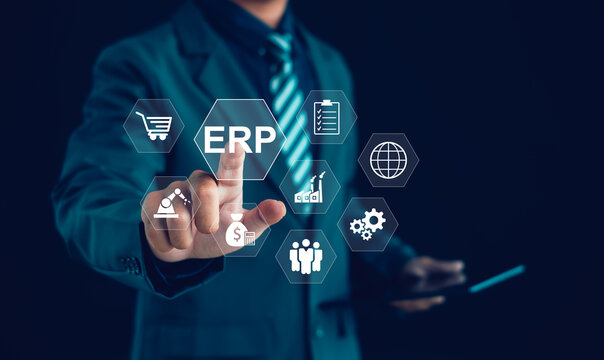 Business professional implementing ERP software for enterprise resource planning, finance, manufacturing, supply chain, workflow automation, business analytics, and digital transformation.