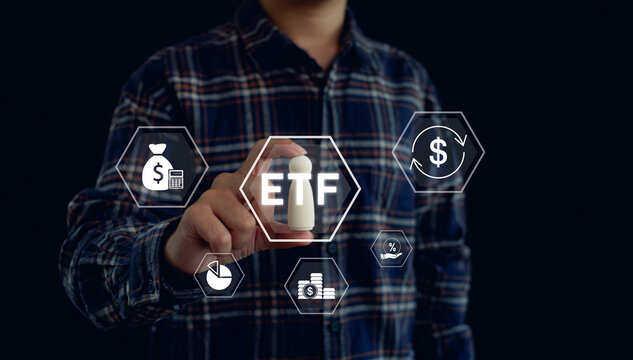 ETF investment concept with a professional managing financial assets, portfolio diversification, market returns and wealth planning through digital investment technology.