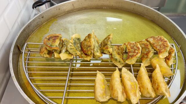 Freshly Cooked Dumplings on Display at Supermarket Ready-Meal Section &ndash; Hot Takeaway Food