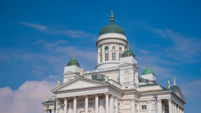White Helsinki Cathedral domes neoclassical architecture with blue sky copy space