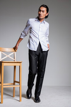 Mature and sophisticated basic menswear, high-quality gray background for portrait photography