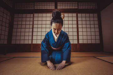 Beautiful japanese woman in a traditional japanese house © oneinchpunch