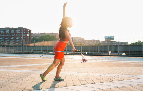 Chinese young woman practicing wushu kung fu.