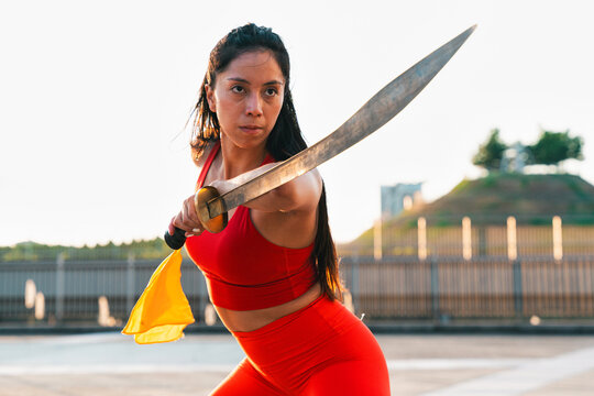 Chinese young woman practicing wushu kung fu.