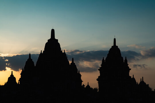 Silhouette of Ancient Candi Plaosan Temple Complex at Sunset in Klaten, Central Java, Indonesia