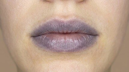 Fototapeta premium Macro close up of human lips showing cyanosis purplish discoloration and impaired blood circulation symptom