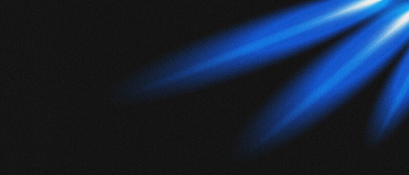 Abstract grainy gradient background blending deep blue and black tones, creating a dynamic and vibrant. Noise texture design.