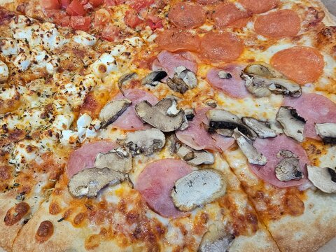 Different pizza slices with various toppings