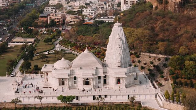 Aerial view of birla mandir temple in jaipur with tourists visiting the famous landmark of rajasthan, india