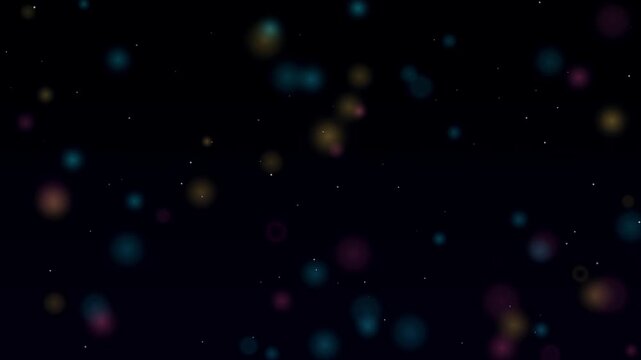 Cinematic bokeh light particles on black background. Soft colorful floating dust overlay. Dreamy glowing orbs for video transitions.