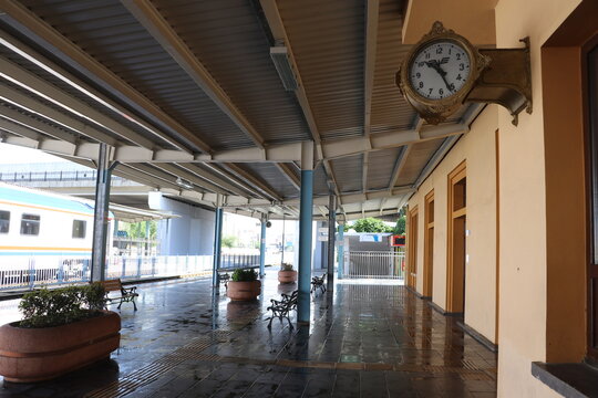 Diyarbakır, Turkey - August 2026: A vintage station clock hanging on the wall of the empty platform at Diyarbakir Railway Station.