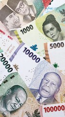 Indonesian rupiah money banknotes pile on table. Indonesia bills of IDR currency close up © Larysa