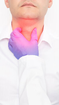 Medical professional gloved hand palpating neck region of man showing inflamed throat during diagnostic examination for thyroid or tonsil issue, vertical photo