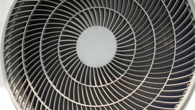 Outdoor Air Conditioner Condenser Fan Operating Close Up