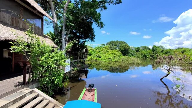 Scenic View of Muesumu Eco Lodge Wooden Cabins and Amazon River in Bolivia
