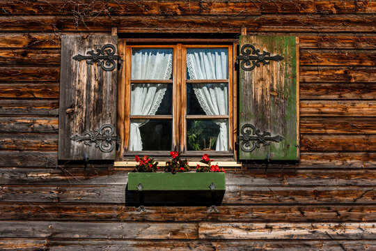 Germany, Bavaria, Schaeftlarn, Window with flower box of a farmhouse