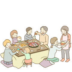大家族みんなでこたつテーブルで食事