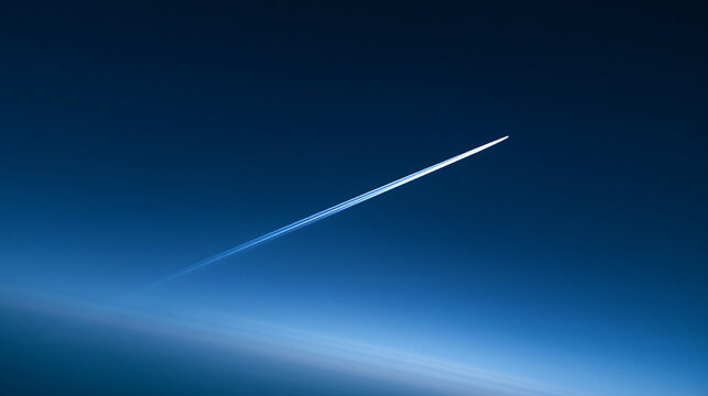 Jet Contrail Crossing Deep Blue Sky at High Altitude