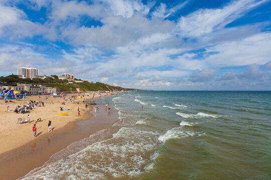 The wide beach borders the sea at the seaside resort of Bournemouth