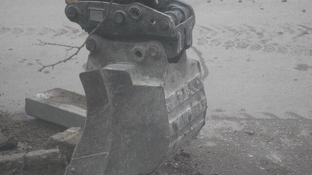 Heavy Machinery Construction Setting Curbstone Using Excavator Precision Bucket Vertical video